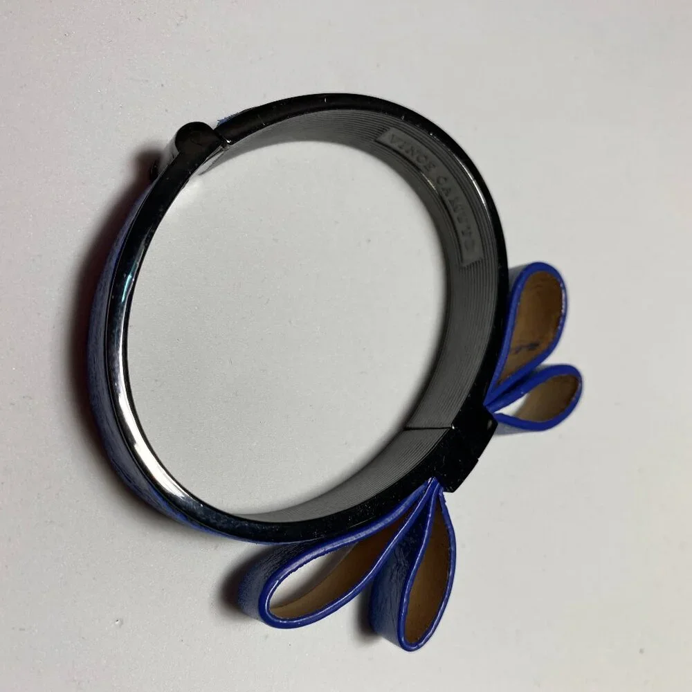 Vince Camuto Blue Bow Hinged Bracelet. Fits up to 6" wrist. - Picture 2 of 3